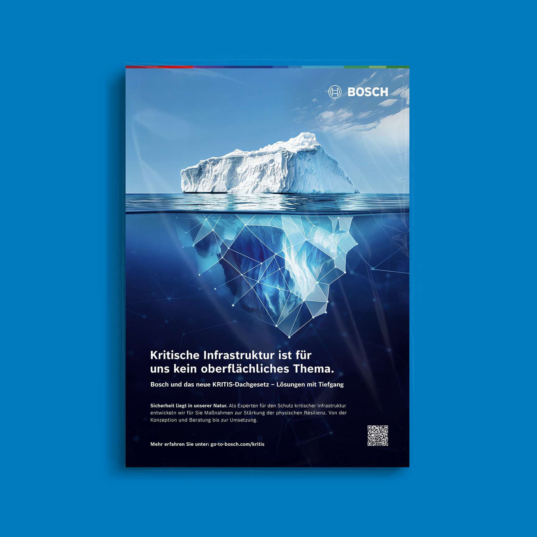 Anzeigenmotiv aus der KRITIS-Kampagne: Unter einem treibenden Eisberg steht die Headline „Kritische Infrastruktur ist für uns kein oberflächliches Thema”.